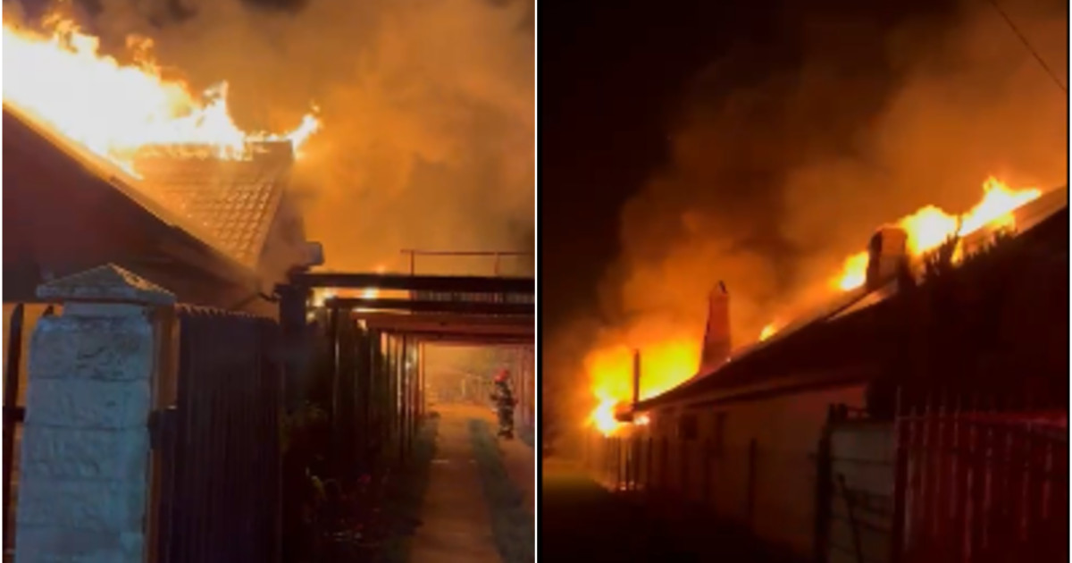 Incendiul într-o casă din Prahova, unde erau mai multe butelii, prezintă un risc de explozie.